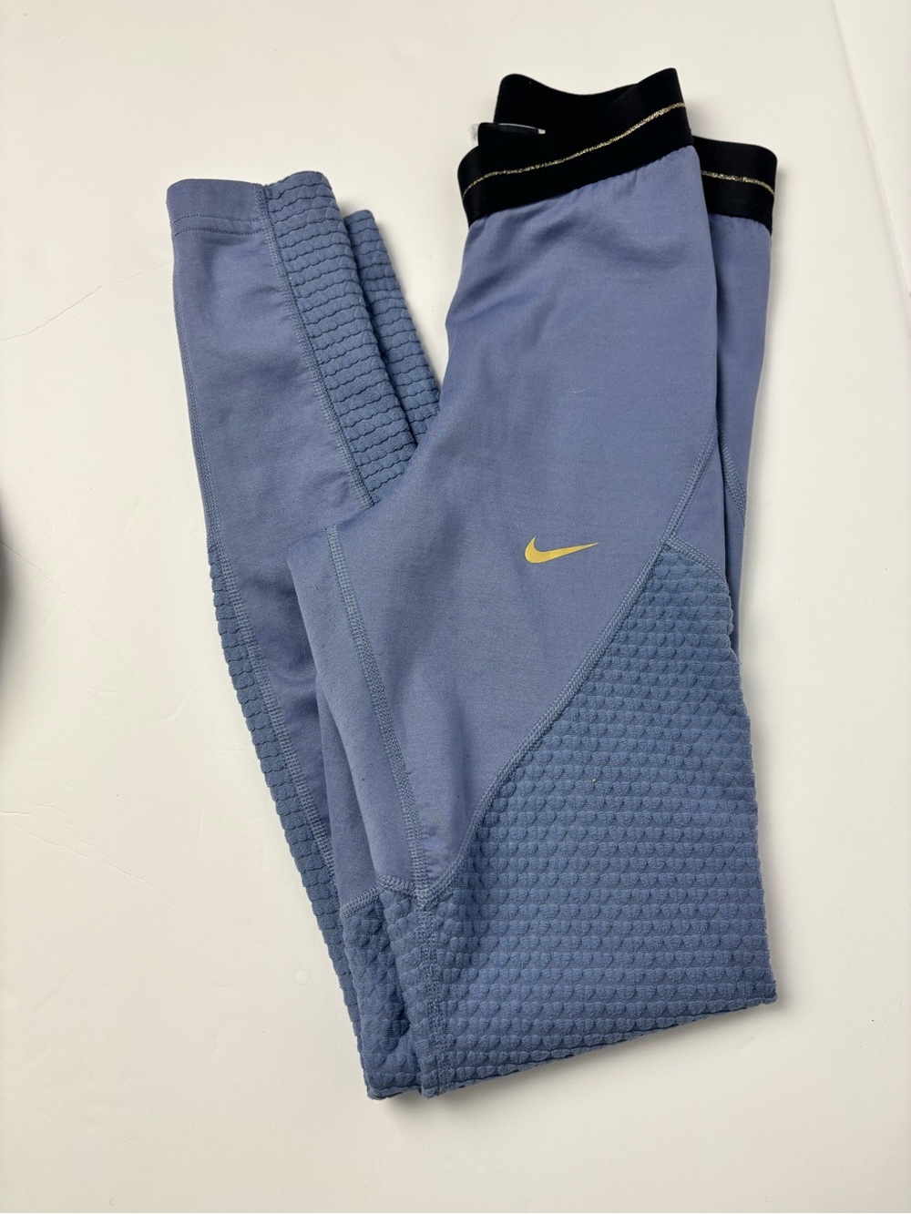 Nike Blue Workout Leggings with Gold Swoosh and Black Waistband XS